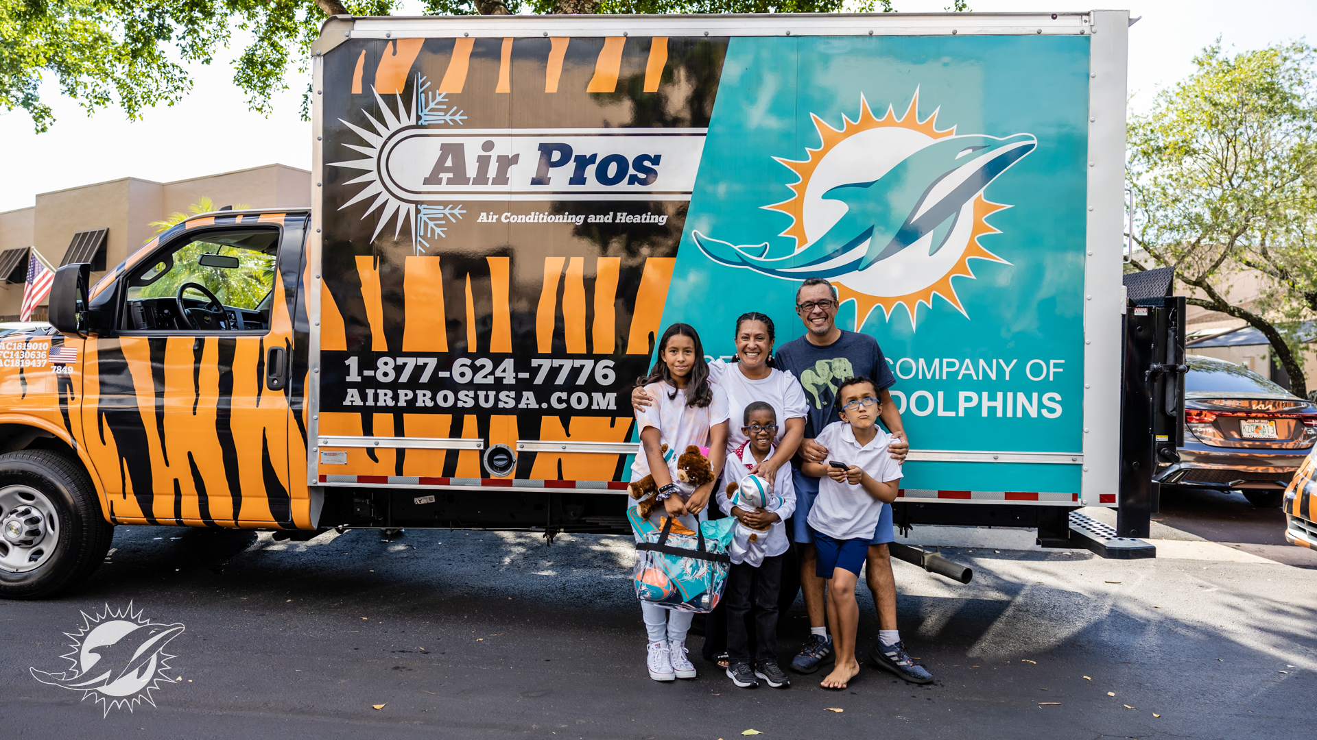 Air Pros USA Teams Up with Miami Dolphins Football UNITES™ to Give Away  Free A/C Units to a Military Family, a Foster Family and Mother in Need -  Air Pros USA